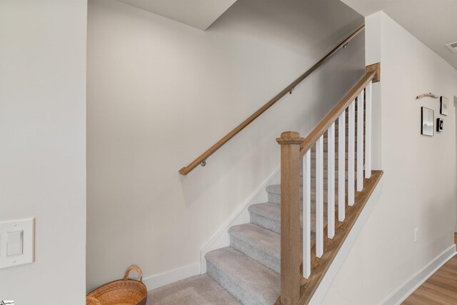 12 Hargrove Ct, Greenville, SC 29617 - stairway with baseboards and visible vents