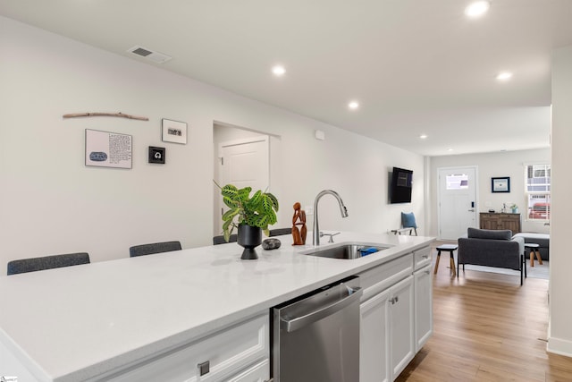 12 Hargrove Ct, Greenville, SC 29617 - kitchen with white cabinets, light countertops, a sink, recessed lighting, and dishwasher