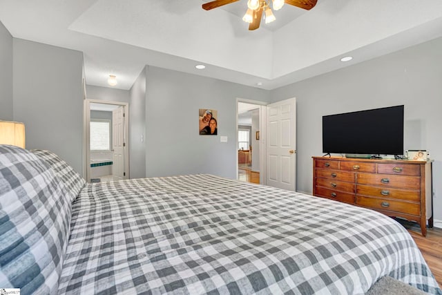 bedroom featuring recessed lighting, wood finished floors, a ceiling fan, and baseboards