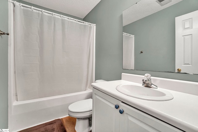 bathroom with shower / bath combo, a textured ceiling, vanity, toilet, and visible vents