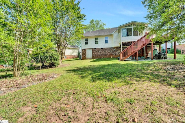 exterior space featuring a sunroom and stairs
