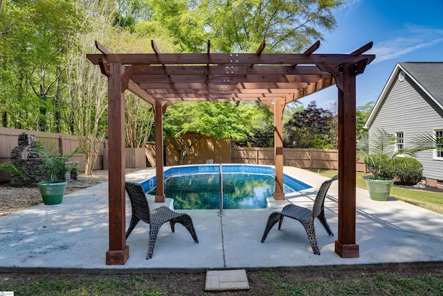 view of pool with a pergola, a fenced in pool, a patio area, and a fenced backyard