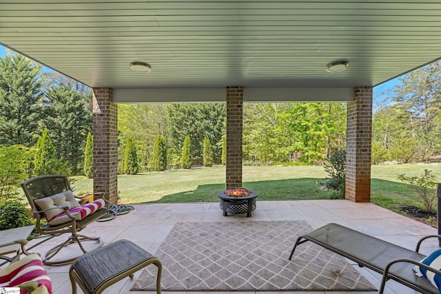 view of patio featuring a fire pit