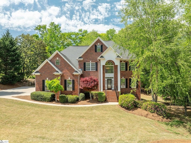 361 E Killarney Lk, Moore, SC 29369 - traditional-style house with a front lawn, brick siding, and roof with shingles