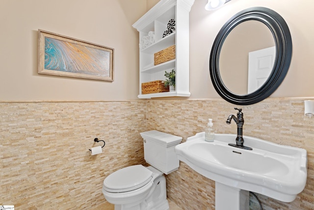 361 E Killarney Lk, Moore, SC 29369 - half bathroom with tile walls, toilet, wainscoting, and a sink