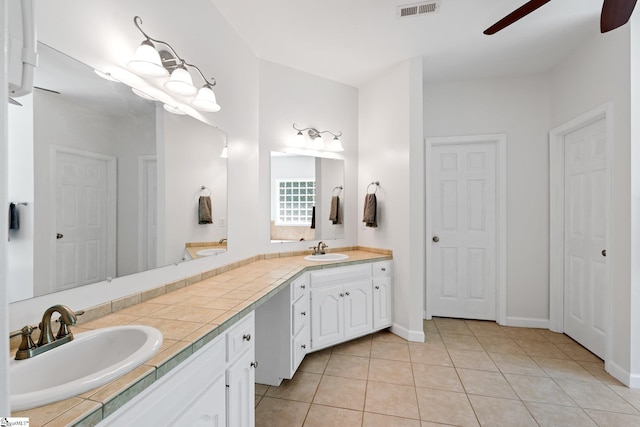 361 E Killarney Lk, Moore, SC 29369 - bathroom featuring double vanity, visible vents, a ceiling fan, and a sink