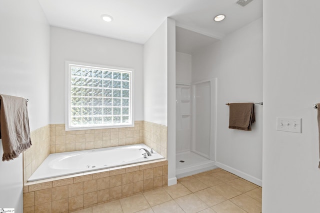 361 E Killarney Lk, Moore, SC 29369 - bathroom with a garden tub, visible vents, tile patterned flooring, and a shower stall