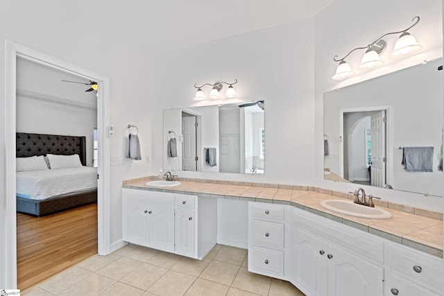 361 E Killarney Lk, Moore, SC 29369 - full bath featuring tile patterned flooring, double vanity, a sink, ceiling fan, and ensuite bathroom