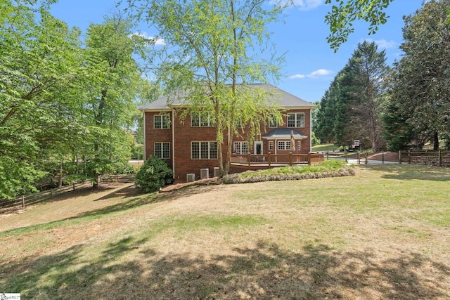 361 E Killarney Lk, Moore, SC 29369 - back of house featuring fence, a lawn, brick siding, and a deck