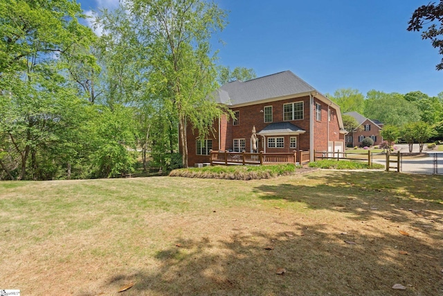 361 E Killarney Lk, Moore, SC 29369 - back of house featuring a wooden deck, a lawn, brick siding, and fence
