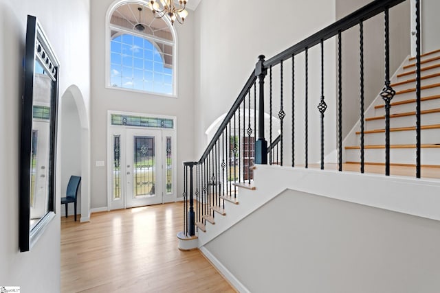 361 E Killarney Lk, Moore, SC 29369 - entryway featuring a towering ceiling, wood finished floors, arched walkways, and a healthy amount of sunlight