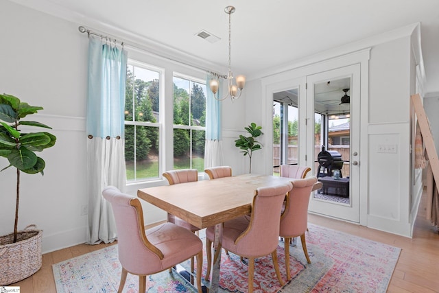 309 Nebbiolo Ln, Simpsonville, SC 29681 - dining area featuring light wood-style flooring and a chandelier