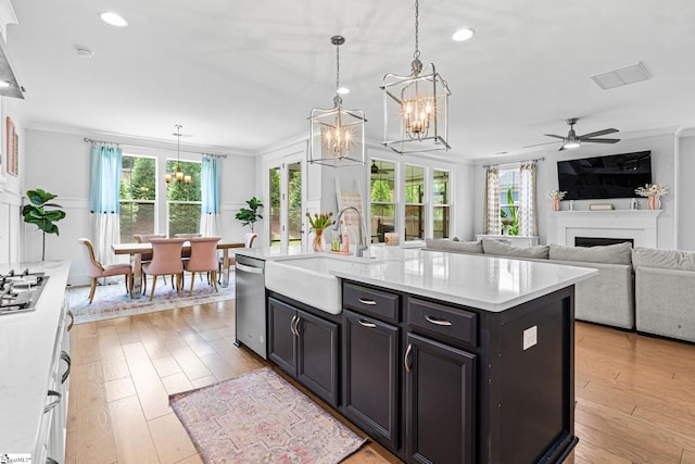 309 Nebbiolo Ln, Simpsonville, SC 29681 - kitchen featuring a chandelier, a sink, light countertops, recessed lighting, and plenty of natural light