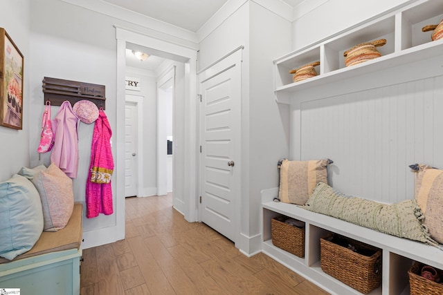309 Nebbiolo Ln, Simpsonville, SC 29681 - mudroom with wood finished floors, crown molding, and baseboards
