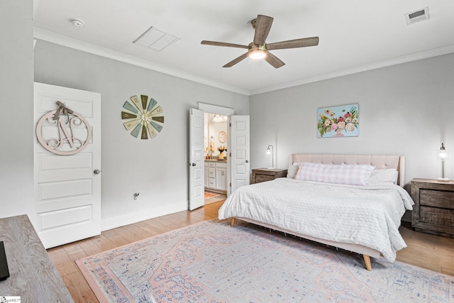 309 Nebbiolo Ln, Simpsonville, SC 29681 - bedroom featuring hardwood / wood-style flooring, ornamental molding, ensuite bath, baseboards, and a ceiling fan
