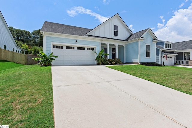 309 Nebbiolo Ln, Simpsonville, SC 29681 - view of front of property with board and batten siding, a garage, concrete driveway, and a porch
