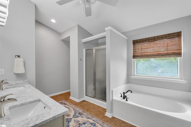full bath with a shower stall, a ceiling fan, and a sink