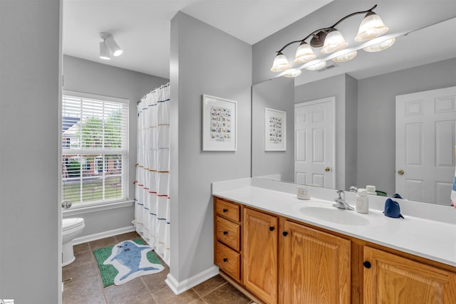 full bathroom with a shower with curtain, toilet, baseboards, tile patterned flooring, and vanity