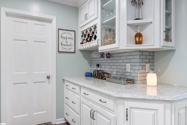 bar with a dry bar and decorative backsplash