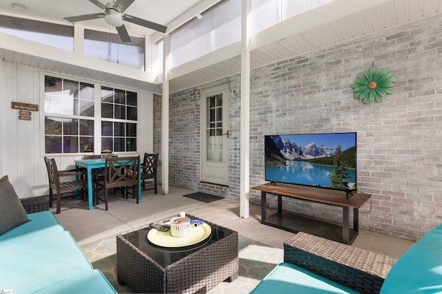 exterior space featuring outdoor dining area, an outdoor living space, and a ceiling fan