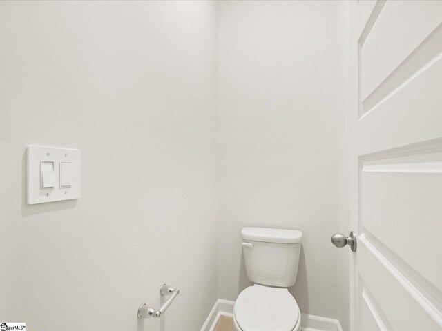 225 Maxwell Dr, Easley, SC 29642 - bathroom featuring baseboards and toilet