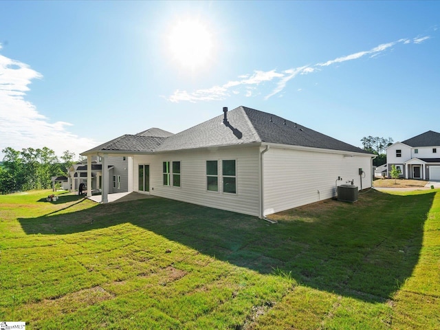 225 Maxwell Dr, Easley, SC 29642 - rear view of property featuring a patio area, a yard, roof with shingles, and cooling unit
