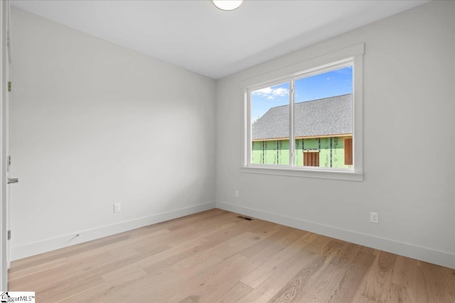 204 Tot Howell Rd, Greer, SC 29651 - empty room featuring light wood-type flooring, baseboards, and visible vents