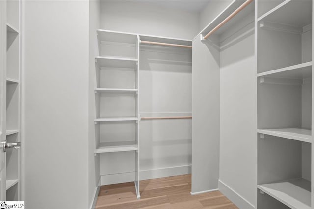 204 Tot Howell Rd, Greer, SC 29651 - walk in closet featuring wood finished floors