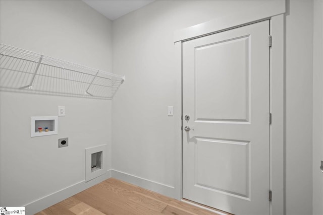 204 Tot Howell Rd, Greer, SC 29651 - laundry area with hookup for an electric dryer, baseboards, light wood-style floors, hookup for a washing machine, and laundry area