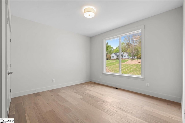 204 Tot Howell Rd, Greer, SC 29651 - spare room with light wood-type flooring, visible vents, and baseboards