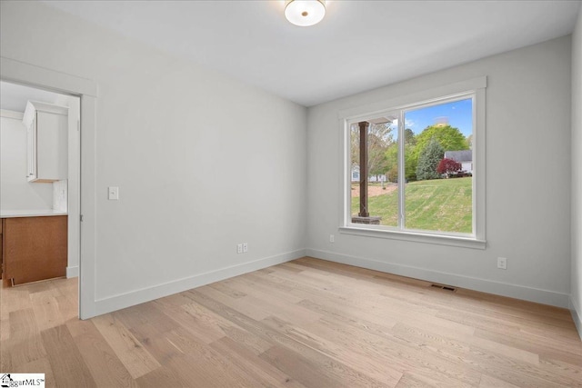 204 Tot Howell Rd, Greer, SC 29651 - empty room featuring baseboards, visible vents, and light wood finished floors
