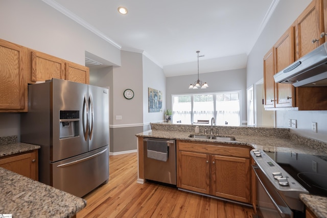 103 Graclan Ct, Simpsonville, SC 29680 - kitchen with brown cabinetry, appliances with stainless steel finishes, a chandelier, and a sink