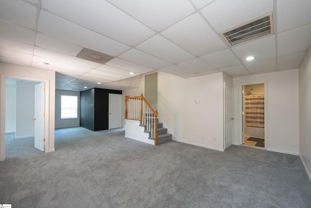 103 Graclan Ct, Simpsonville, SC 29680 - basement featuring a paneled ceiling, baseboards, visible vents, stairs, and carpet floors