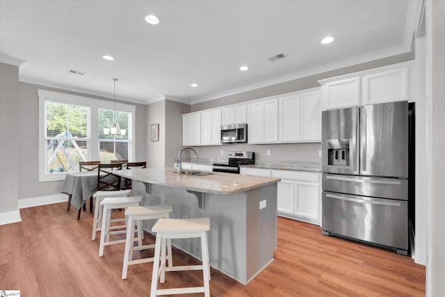 200 Noble St, Greer, SC 29651 - kitchen featuring stainless steel appliances, visible vents, a sink, and crown molding