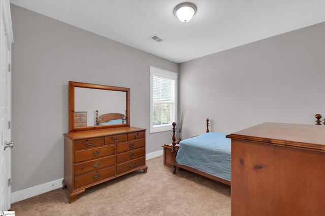 200 Noble St, Greer, SC 29651 - bedroom with baseboards, visible vents, and light colored carpet