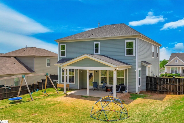 200 Noble St, Greer, SC 29651 - rear view of house featuring a fenced backyard, a yard, a patio area, and a shingled roof