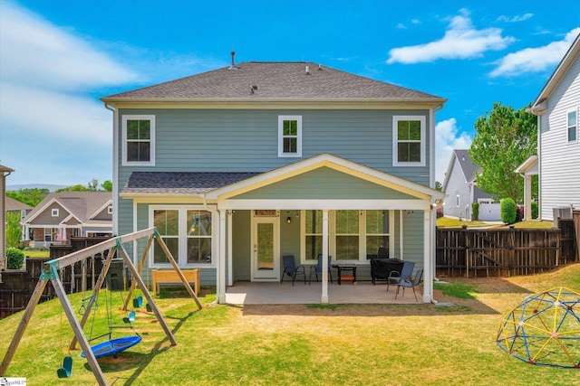 200 Noble St, Greer, SC 29651 - back of house with a lawn, a fenced backyard, a playground, and a patio