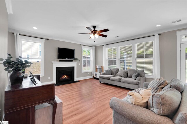 200 Noble St, Greer, SC 29651 - living room with a fireplace with flush hearth, light wood finished floors, visible vents, recessed lighting, and ceiling fan