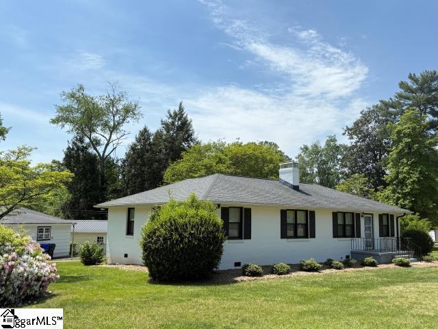 28 Alpine Way, Greenville, SC 29609 - exterior space with a chimney and a front yard