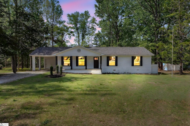 181 Skyland Dr, Clinton, SC 29325 - ranch-style home featuring an attached carport, a front yard, dirt driveway, and covered porch