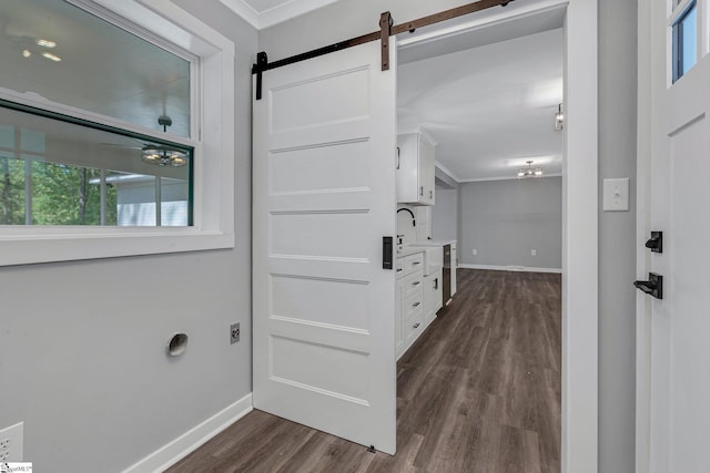 181 Skyland Dr, Clinton, SC 29325 - interior space with crown molding, baseboards, dark wood finished floors, and a barn door