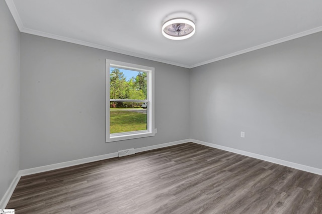 181 Skyland Dr, Clinton, SC 29325 - unfurnished room with visible vents, baseboards, wood finished floors, and ornamental molding