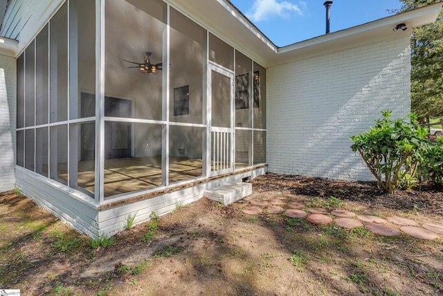 181 Skyland Dr, Clinton, SC 29325 - exterior space featuring brick siding and a sunroom