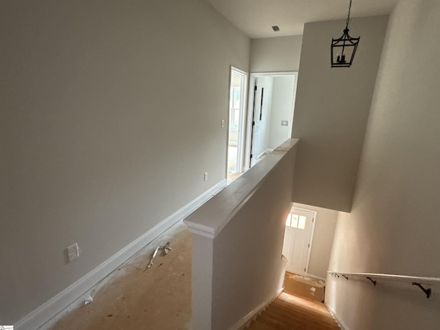 stairs featuring baseboards