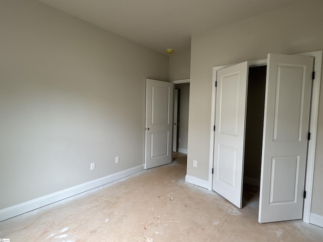 unfurnished bedroom featuring baseboards