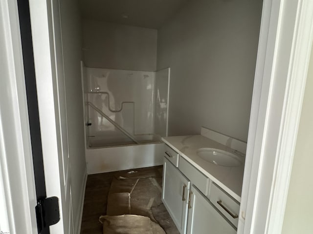 bathroom featuring vanity and washtub / shower combination