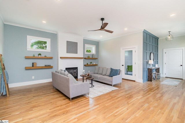 827 S Academy St, Greenville, SC 29601 - living area featuring ceiling fan, baseboards, crown molding, and a fireplace