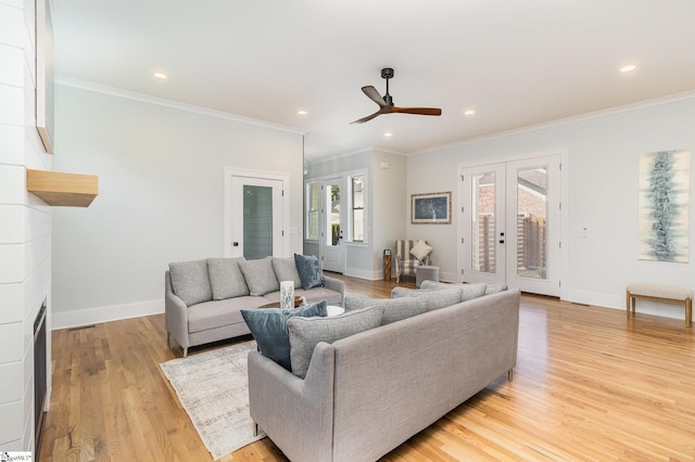 827 S Academy St, Greenville, SC 29601 - living area featuring light wood-style floors, ornamental molding, ceiling fan, and french doors