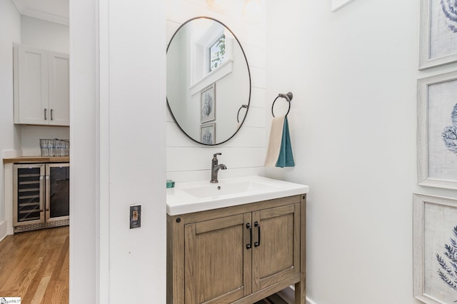 827 S Academy St, Greenville, SC 29601 - bathroom featuring vanity, beverage cooler, and wood finished floors