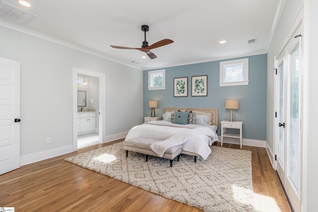 827 S Academy St, Greenville, SC 29601 - bedroom featuring light wood-style floors, visible vents, crown molding, and baseboards